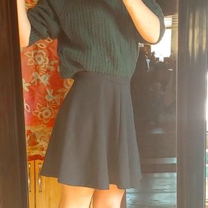 Schoolgirl style black skirt